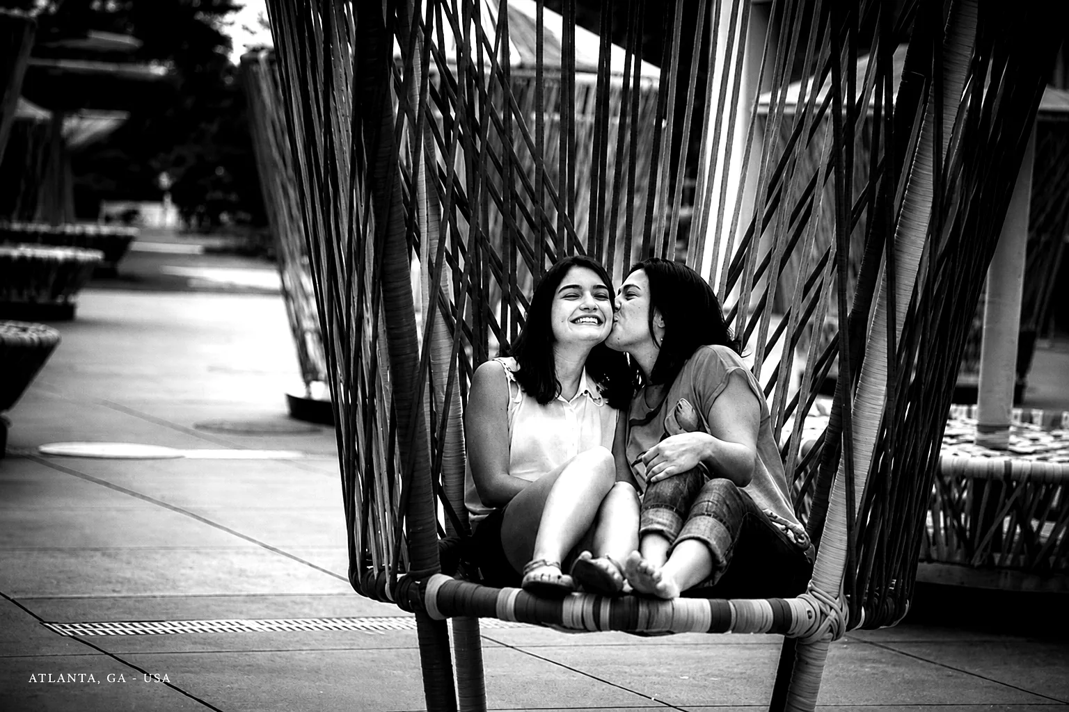 Black-and-white El Beso photograph of a joyful moment in Atlanta, Georgia.